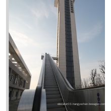 Outside Escalator with High Rise